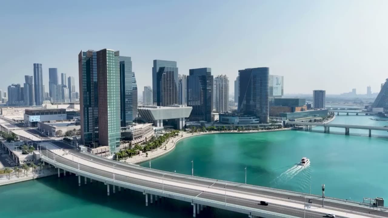 The Ritz-Carlton Residences, Al Maryah Island, Abu Dhabi — aerial of the canal and the tower